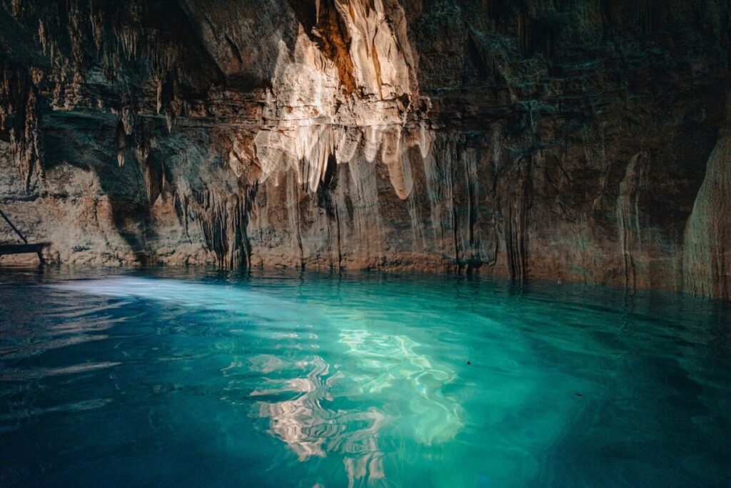Guía de cenotes en Tulum y Riviera Maya 2026 cenote, cave, yucatán, nature, water, groundwater, rock formation, blue, peaceful, calm, mexico, natural beauty, clear water, vacation, tropical, rock cave, geology, attractive, light, reflection